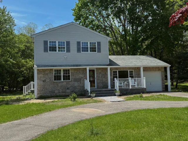 Front view of 8 Mill Lot Road, Middle Island, NY 11953